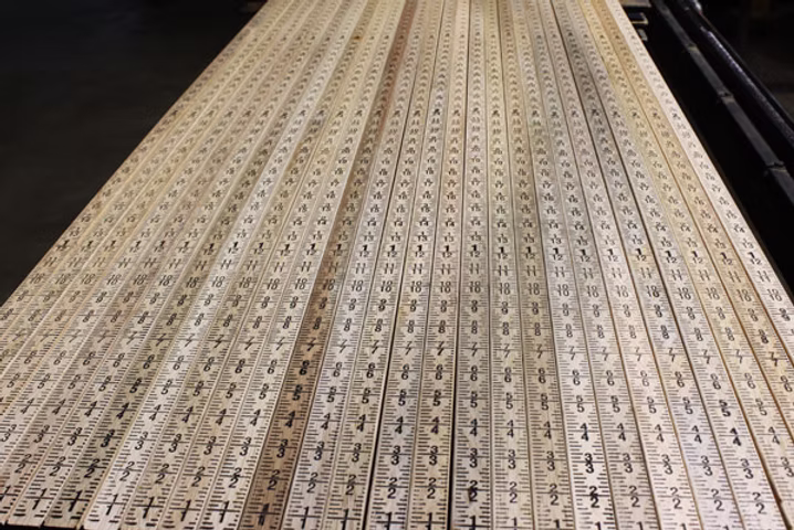 Bagby wooden gage sticks during the printing process